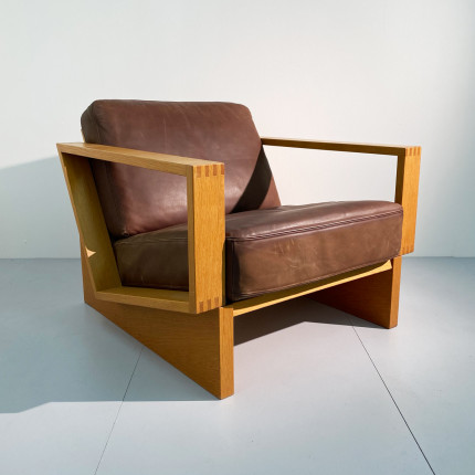 Large wood and leather brutalist easy chair