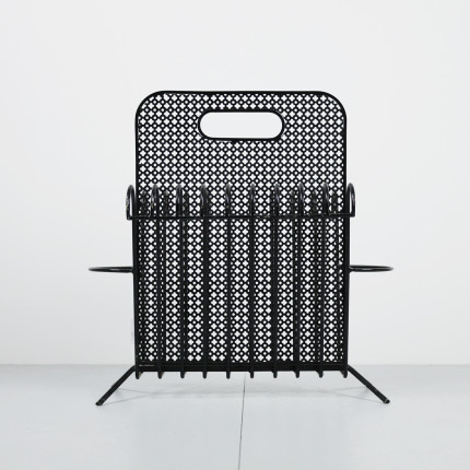 Black metal magazine rack by Mathieu Mategot